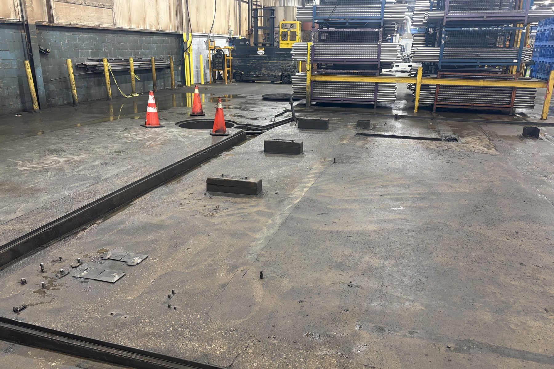 Cordoned work zone during concrete pad and floor works